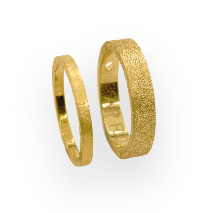 Set trouwringen 18kt geelgoud