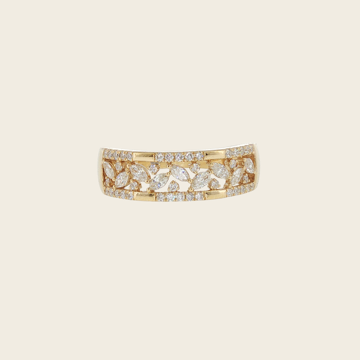 Brede geelgouden ring met bloemmotief en diamanten