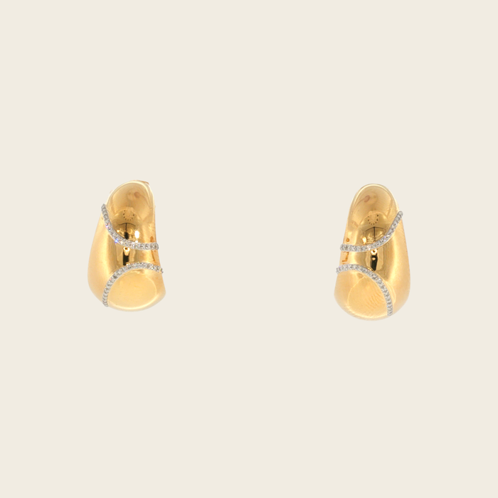 Brede geelgouden creolen met diamanten accent