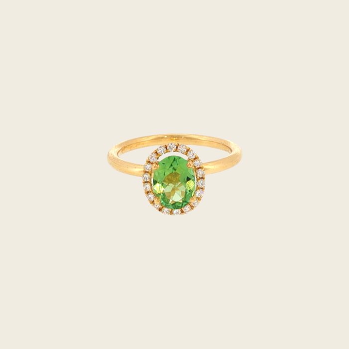 Geelgouden ring met ovale peridoot en halo