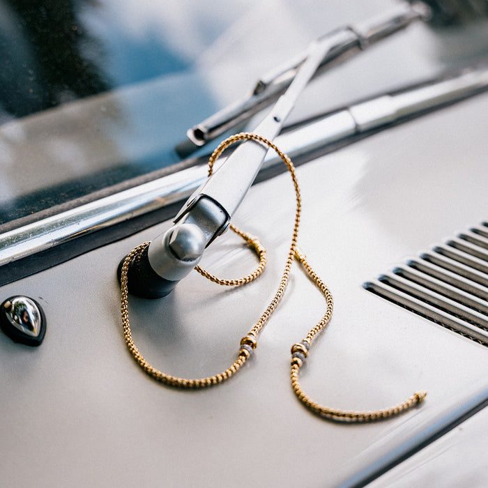 Gouden ketting met bicolor en diamant details