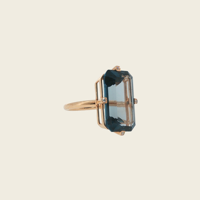 Ring roségoud met blauwe topaas & briljant
