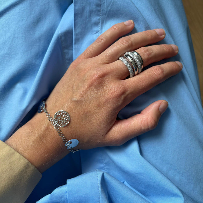 Ring in witgoud met brede pavé banen – 18kt