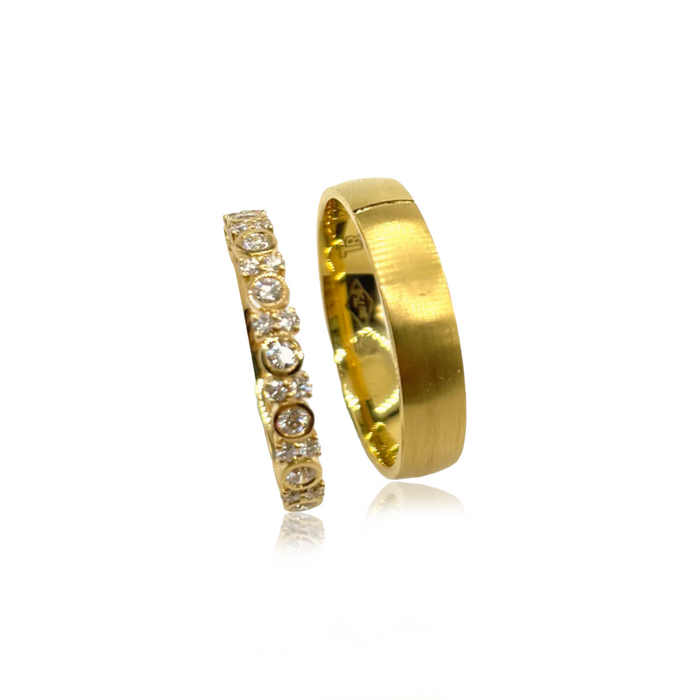Geelgouden trouwringen met diamant