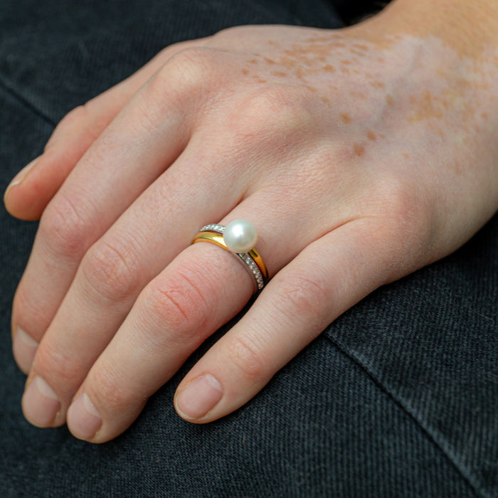 Bicolor ring met parel en diamanten