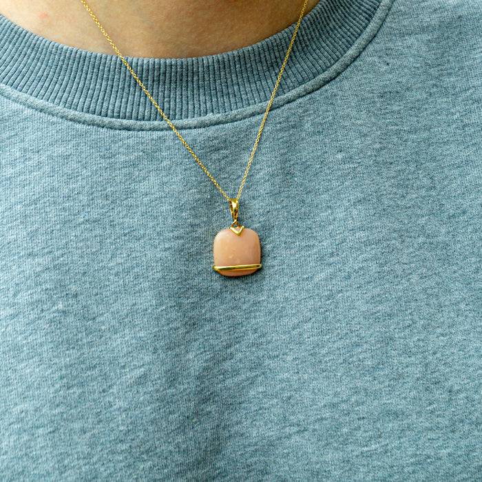 Gouden hanger met koraal