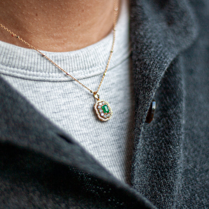 Geelgouden hanger met smaragd en briljant
